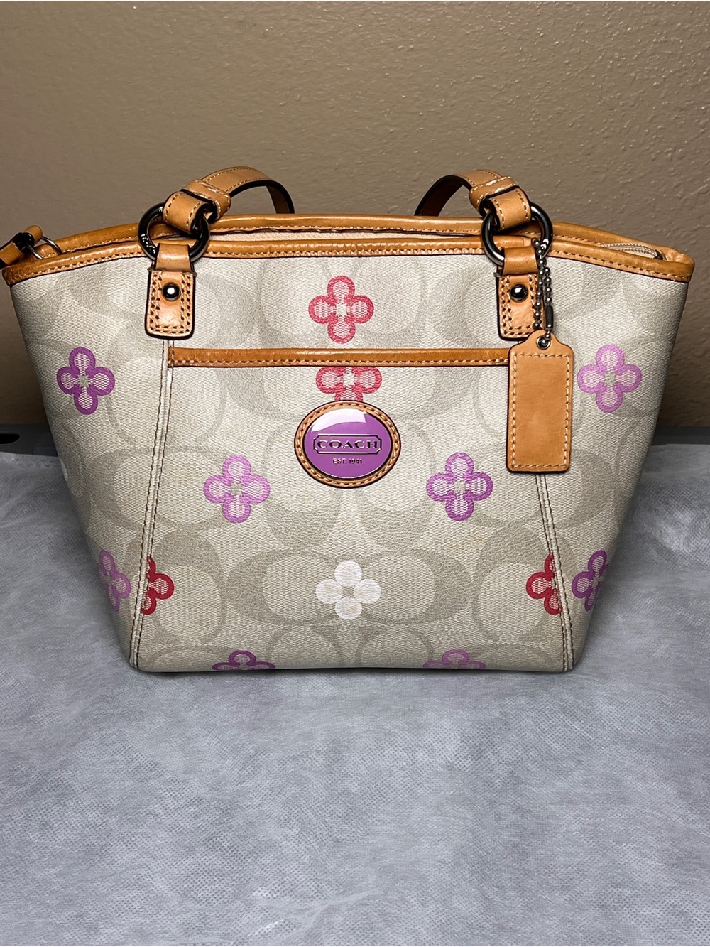 Coach Peyton Signature Canvas Tote in Purple and Pink Floral Print and Tan Trim